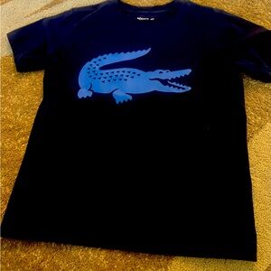 Lacoste boy dark blue shirt . Cotton and polyester short sleeve . 12 year sport